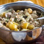 pan with finished creamy mustard chicken ready to serve.